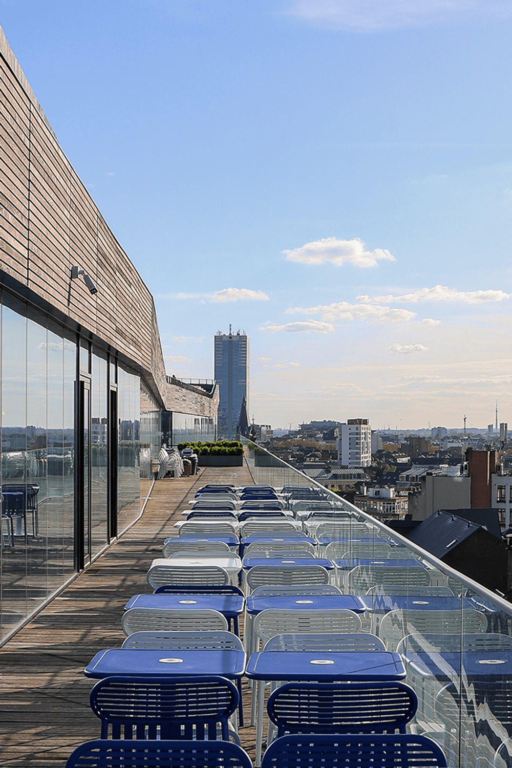 Rooftop 58 Panoramic view long Terrace blue chairs