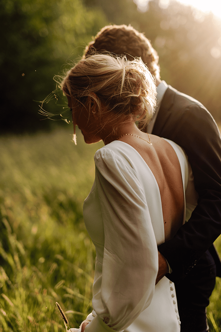 Wedding couple nature sun ray intimate moment
